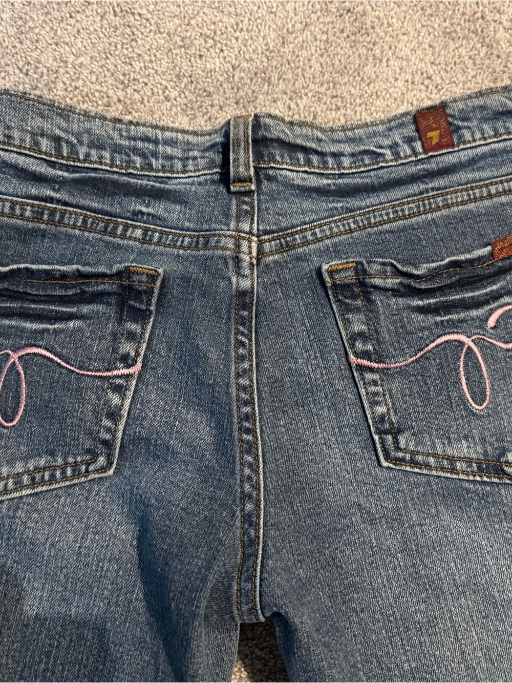 7 For All Mankind Low-Rise Bootcut Jeans with Pink Embroidered Pockets